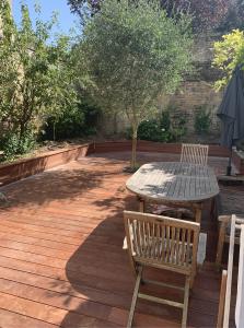 Maison d'intérieur - construction d'une extension en bois avec terrasse sur Caen, en Normandie 