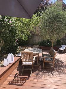 Maison d'intérieur - construction d'une extension en bois avec terrasse sur Caen, en Normandie 