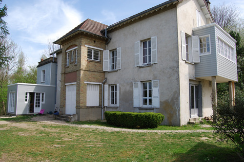 Construction d'une double extension en bois pour maison de village dans les Yvelines